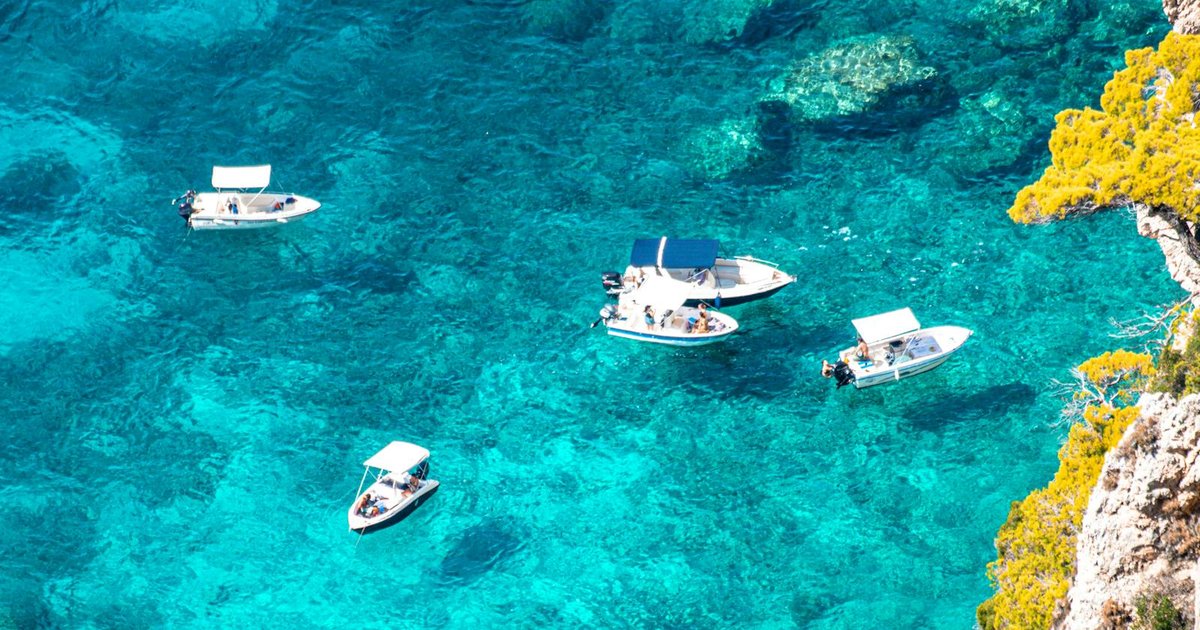 Aerial view of Paleokastritsa's turquoise bays and dramatic cliffs on Corfu's west coast